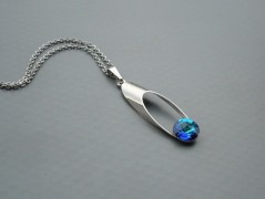 Rudý oválný přívěsek nerez řetízek