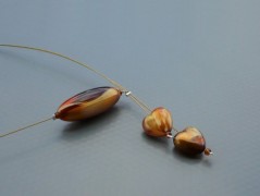 Rudý oválný přívěsek nerez řetízek